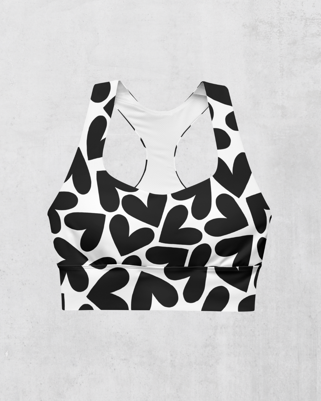 Black heart patterned sports bra on a white background