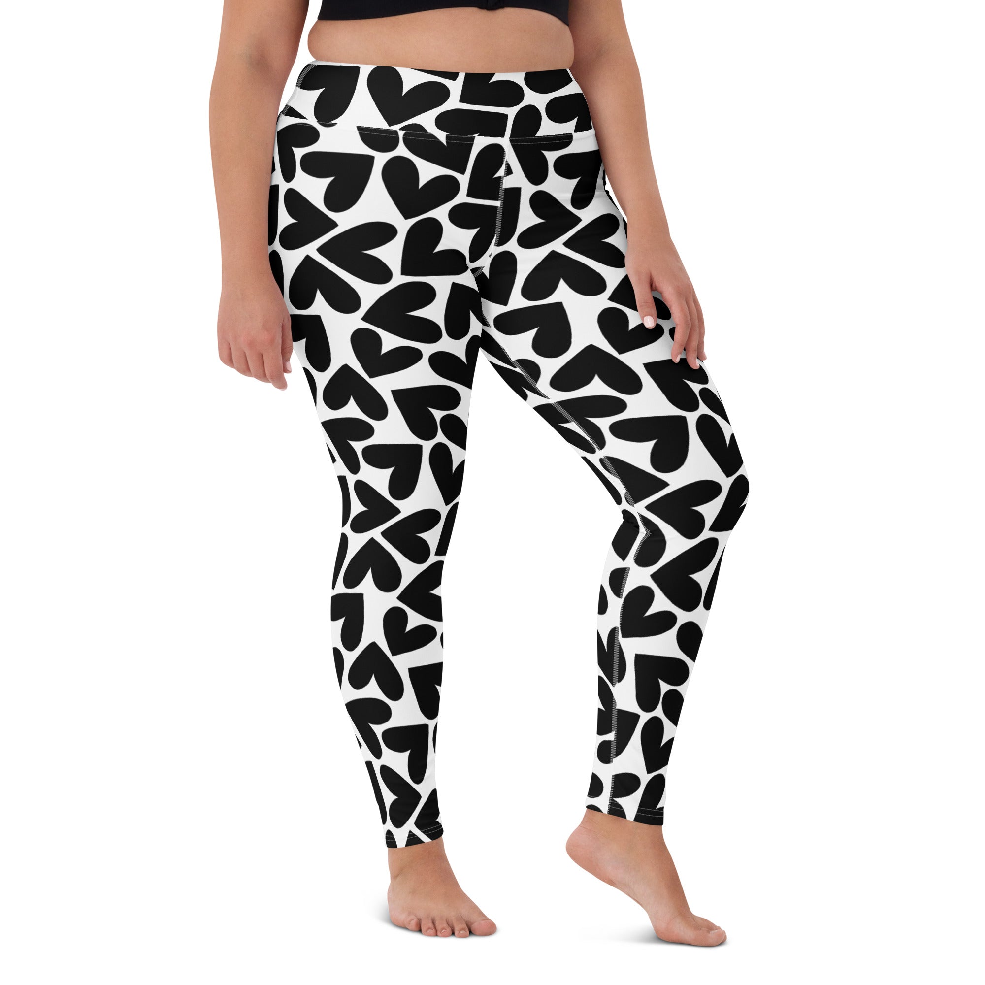 Black and white hearts print yoga leggings front view