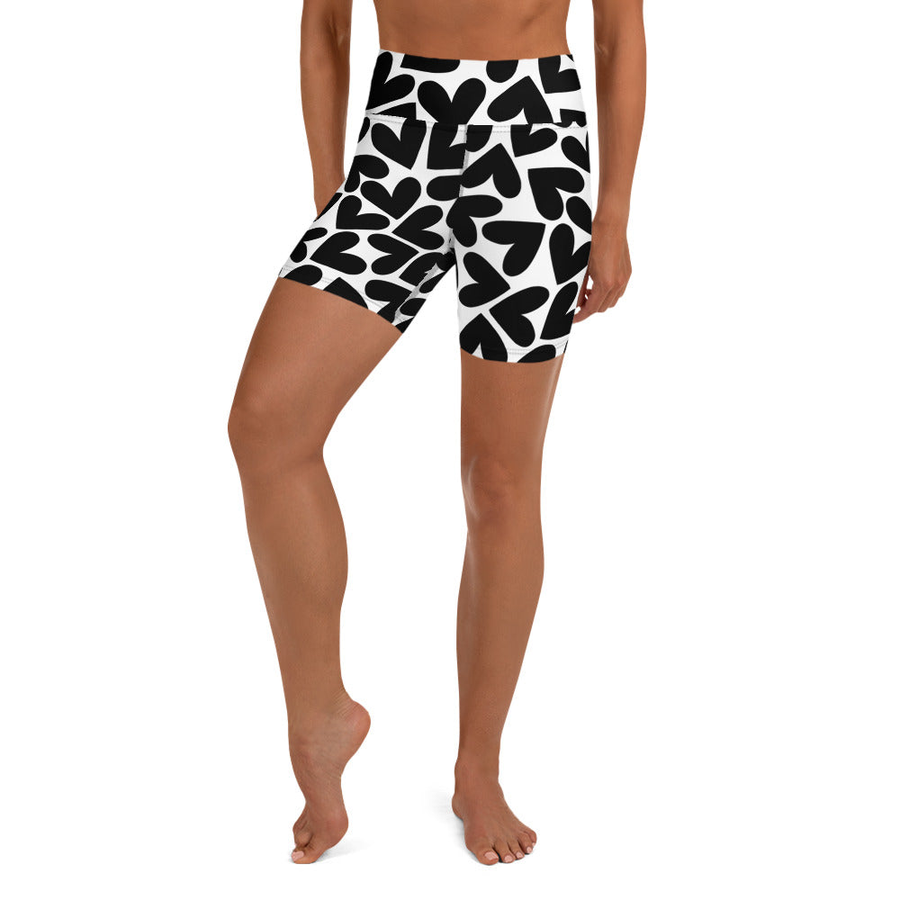 Black and white hearts pattern short yoga shorts front view