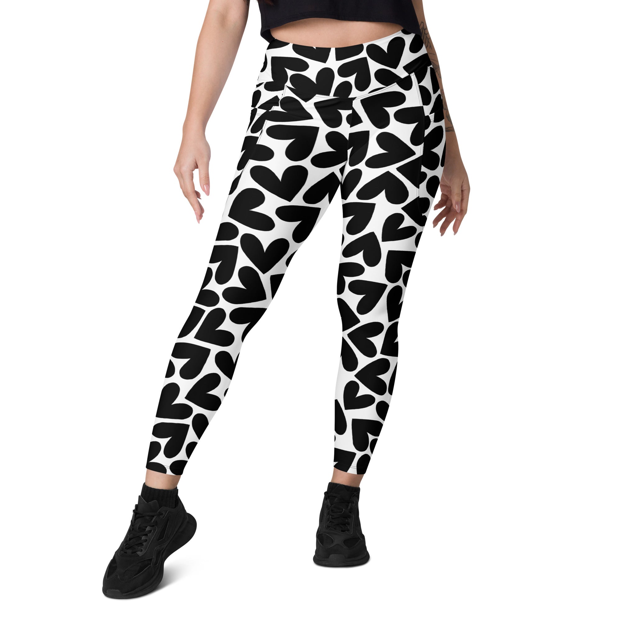 Black and white hearts print recycled yoga leggings with pockets, front view