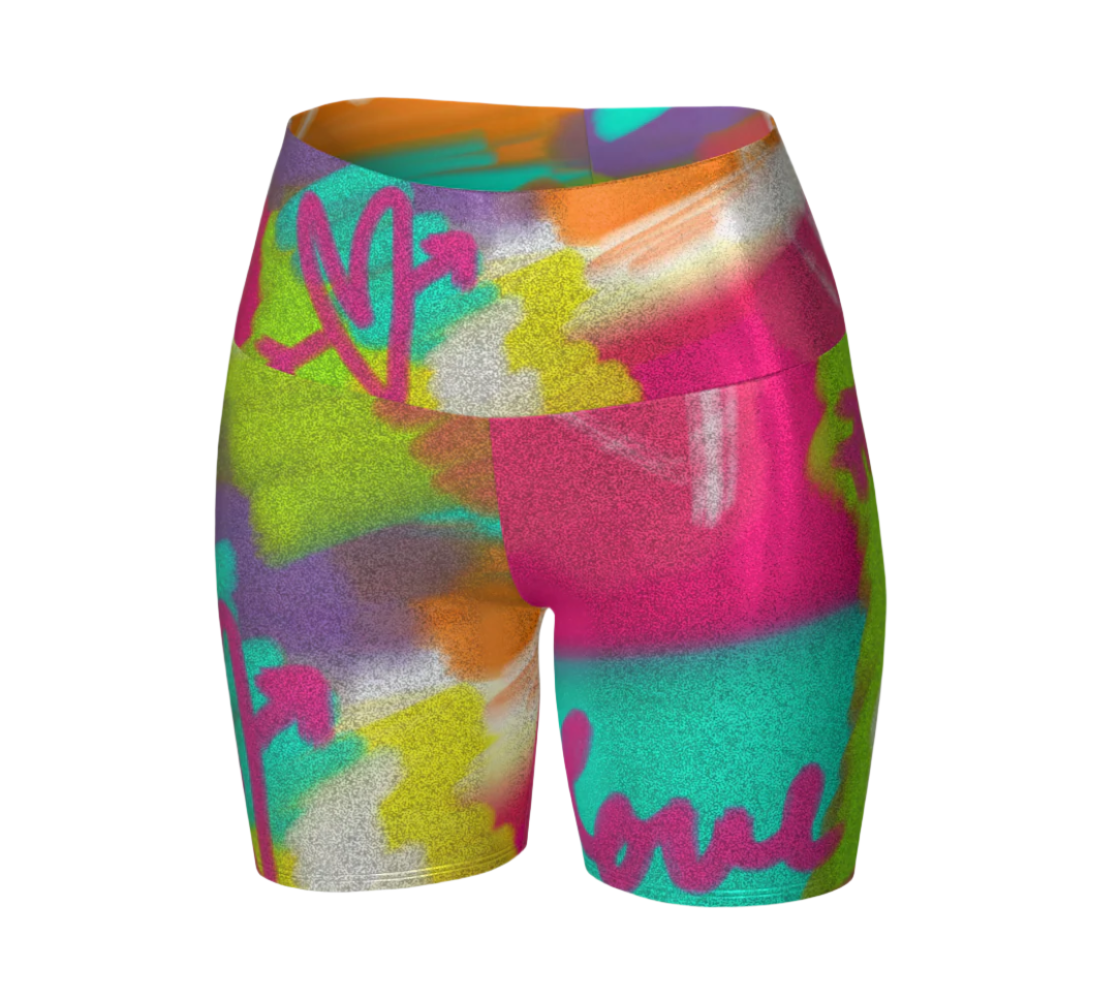 Colorful glitter shorts with abstract design and text on a light gray background