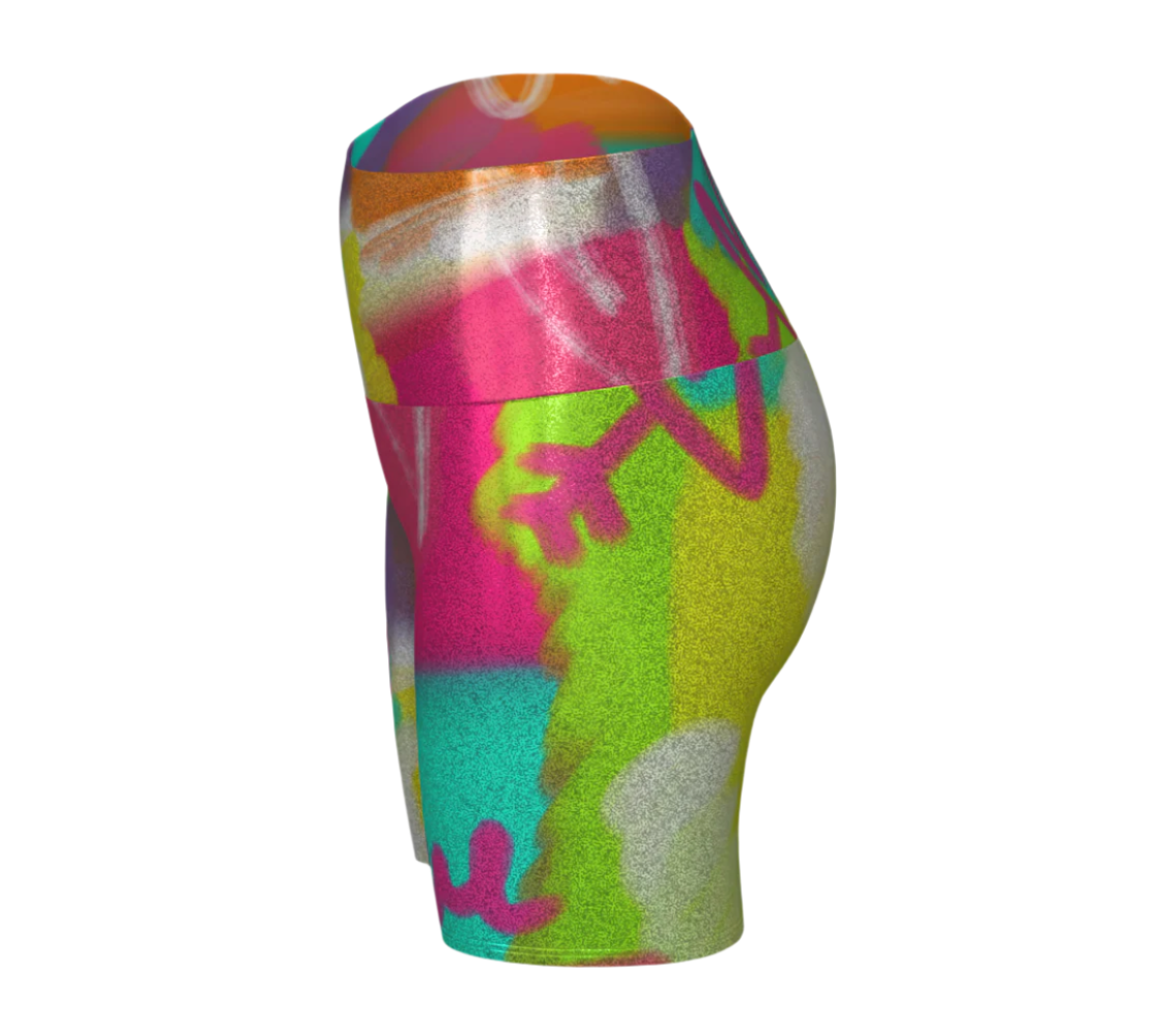 Colorful patterned glitter shorts on a white background left side