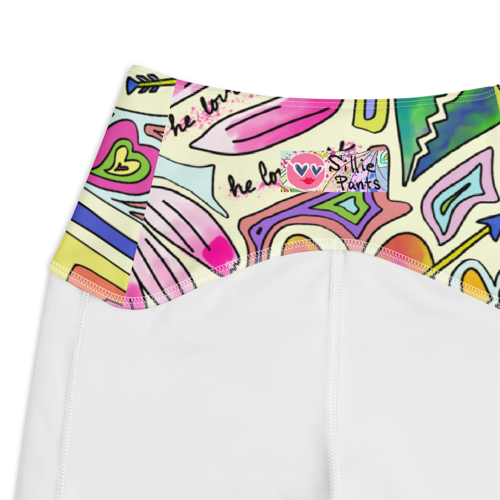 Colorful recycled yoga leggings with fairy dust print and side pockets, inside logo