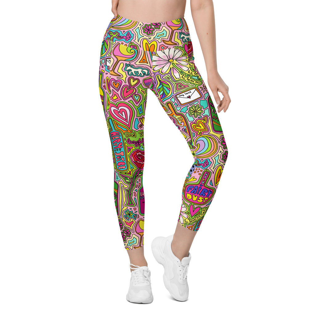 Colorful recycled yoga leggings with fairytale print and side pockets, front side