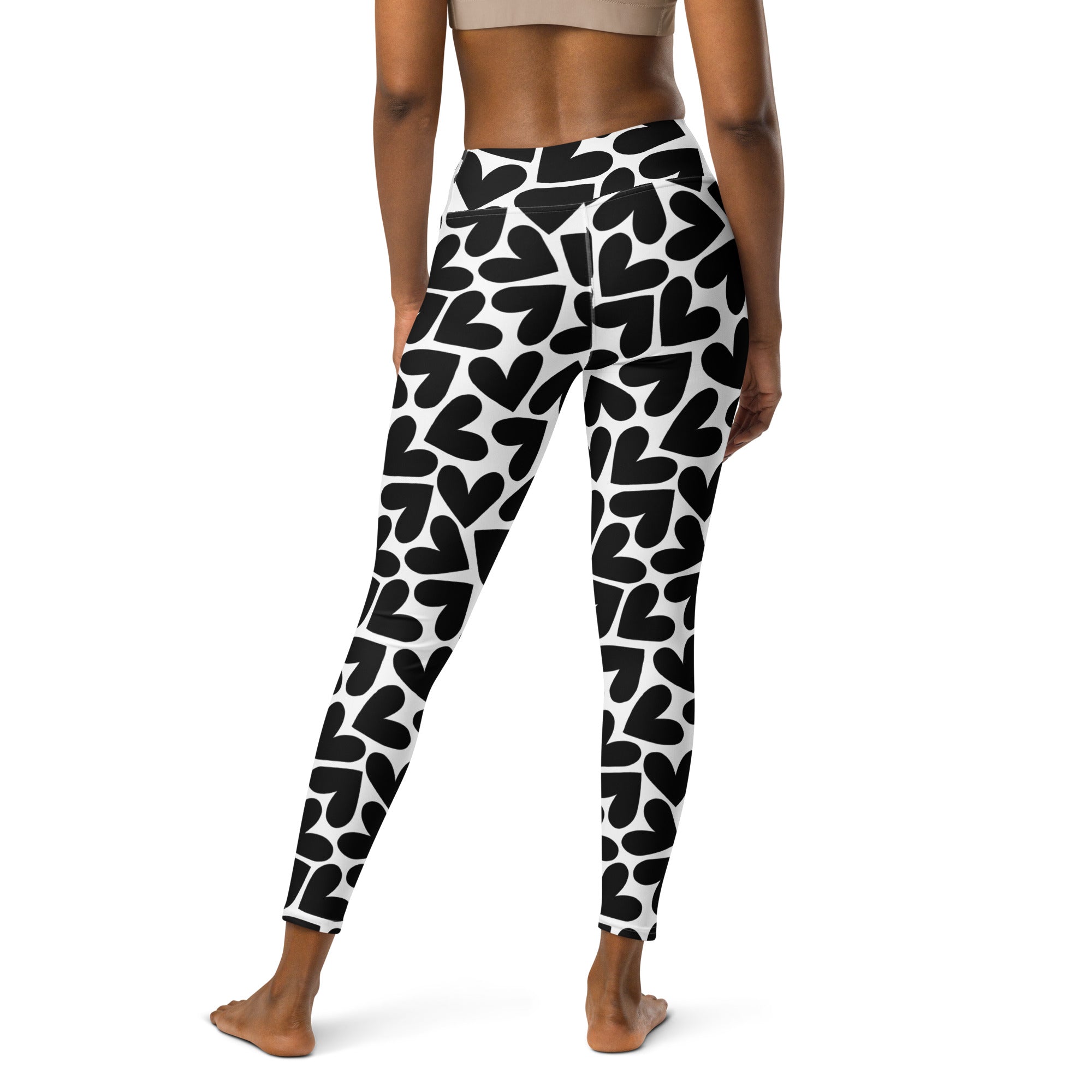 Colorful soft yoga leggings with black and white hearts print, back side
