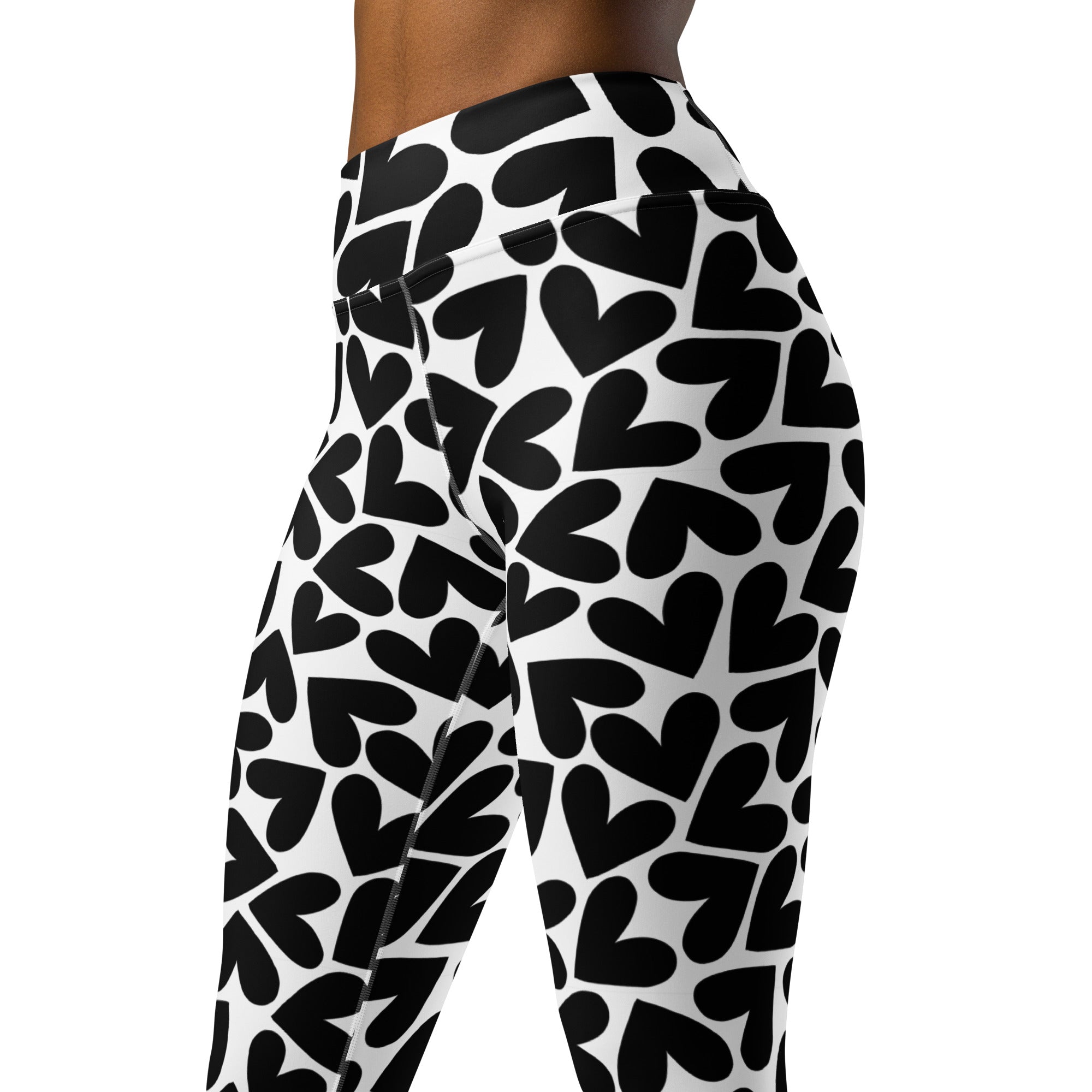Colorful soft yoga leggings with black and white hearts print, waistband closeup