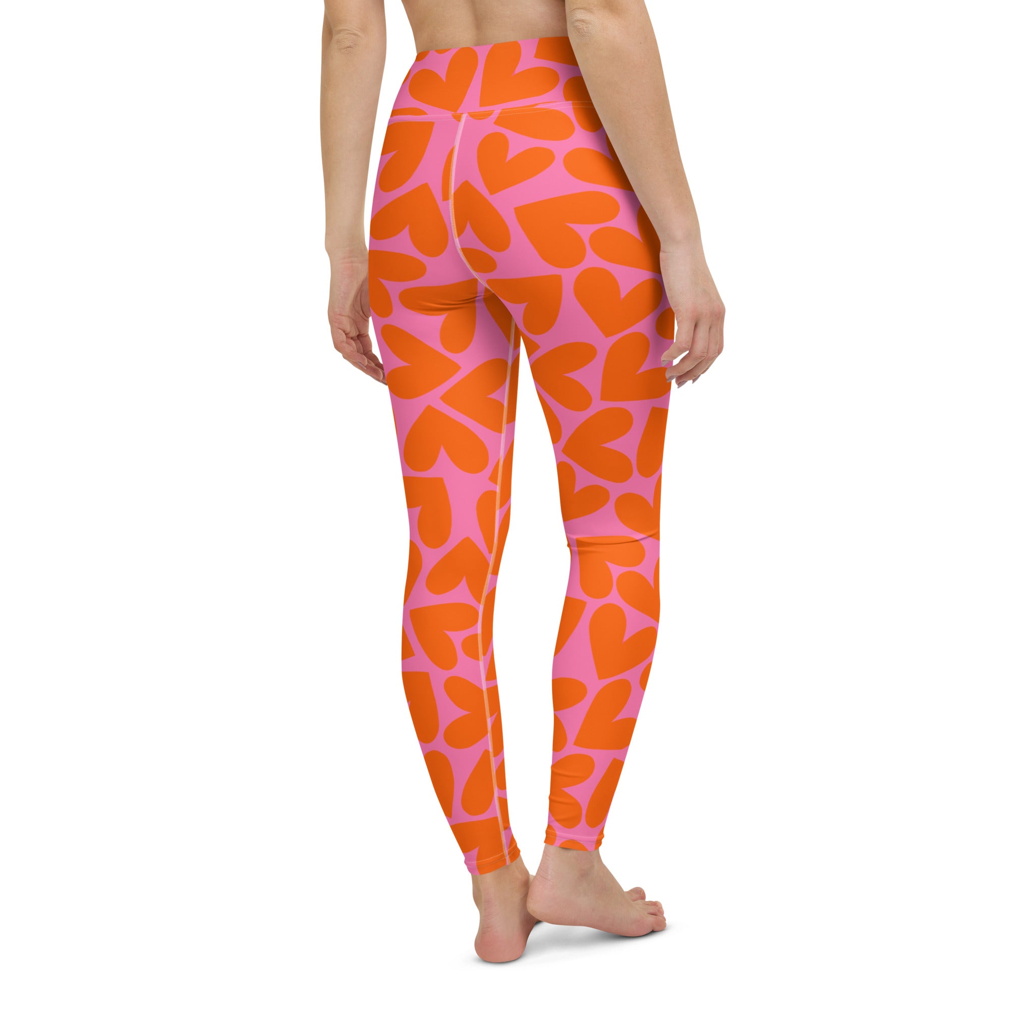 Colorful soft yoga leggings with orange and pink hearts pattern print, back side