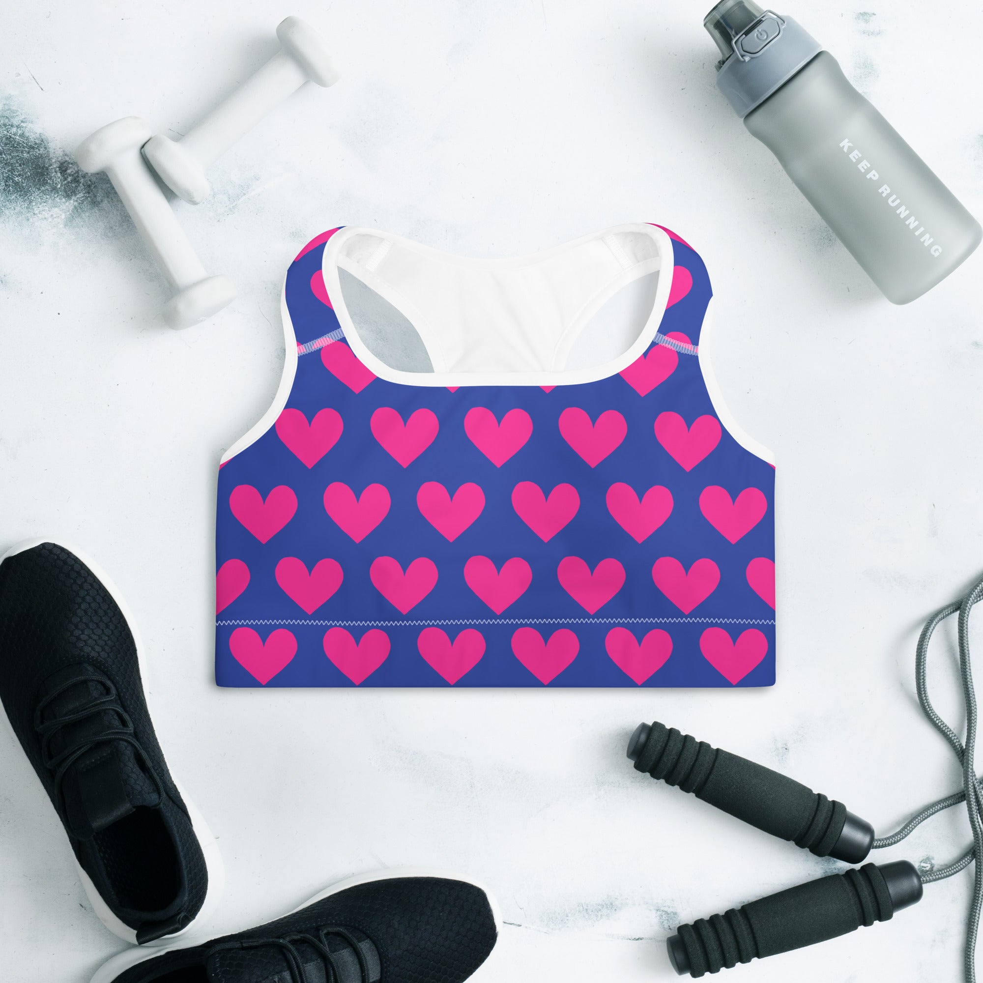 Colorful sports bra with blue pink hearts print front side