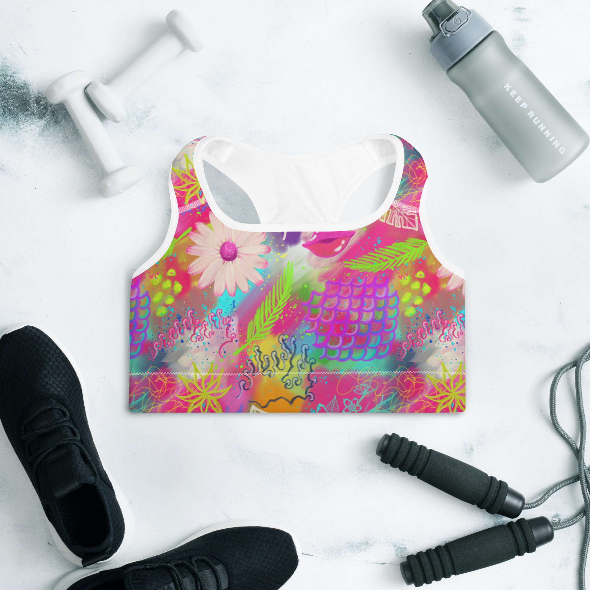Colorful sports bra with pink tropical print front side