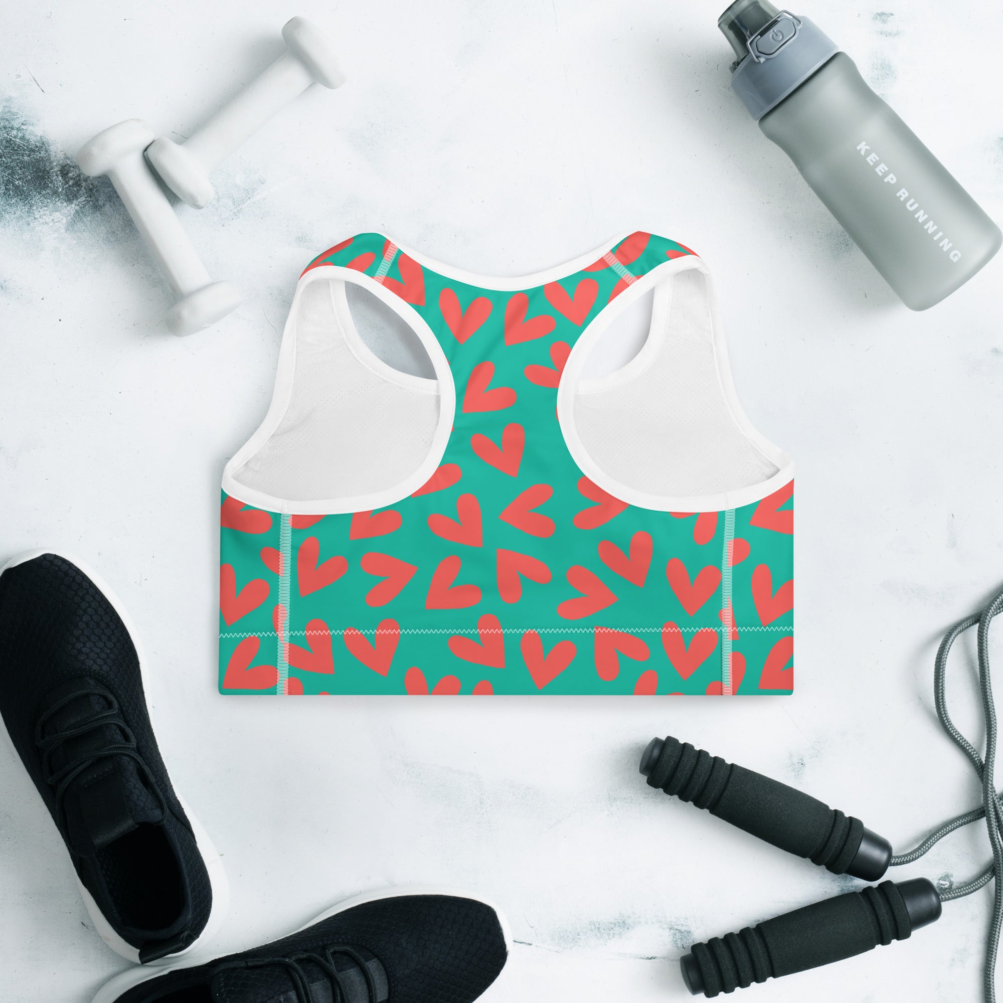 Colorful sports bra with teal and coral pink hearts print back side