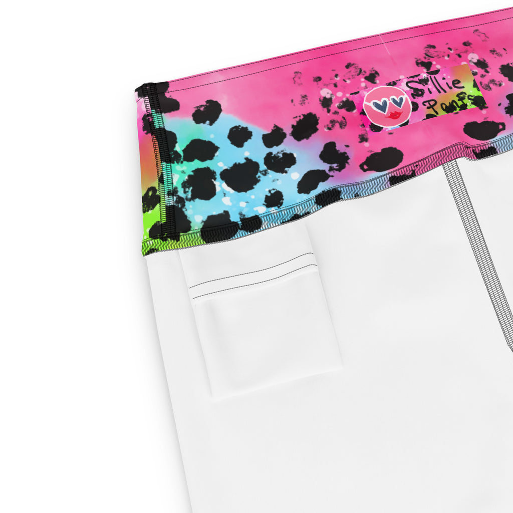 Yoga leggings with colorful animal print and small back pocket at the waistband on a white background