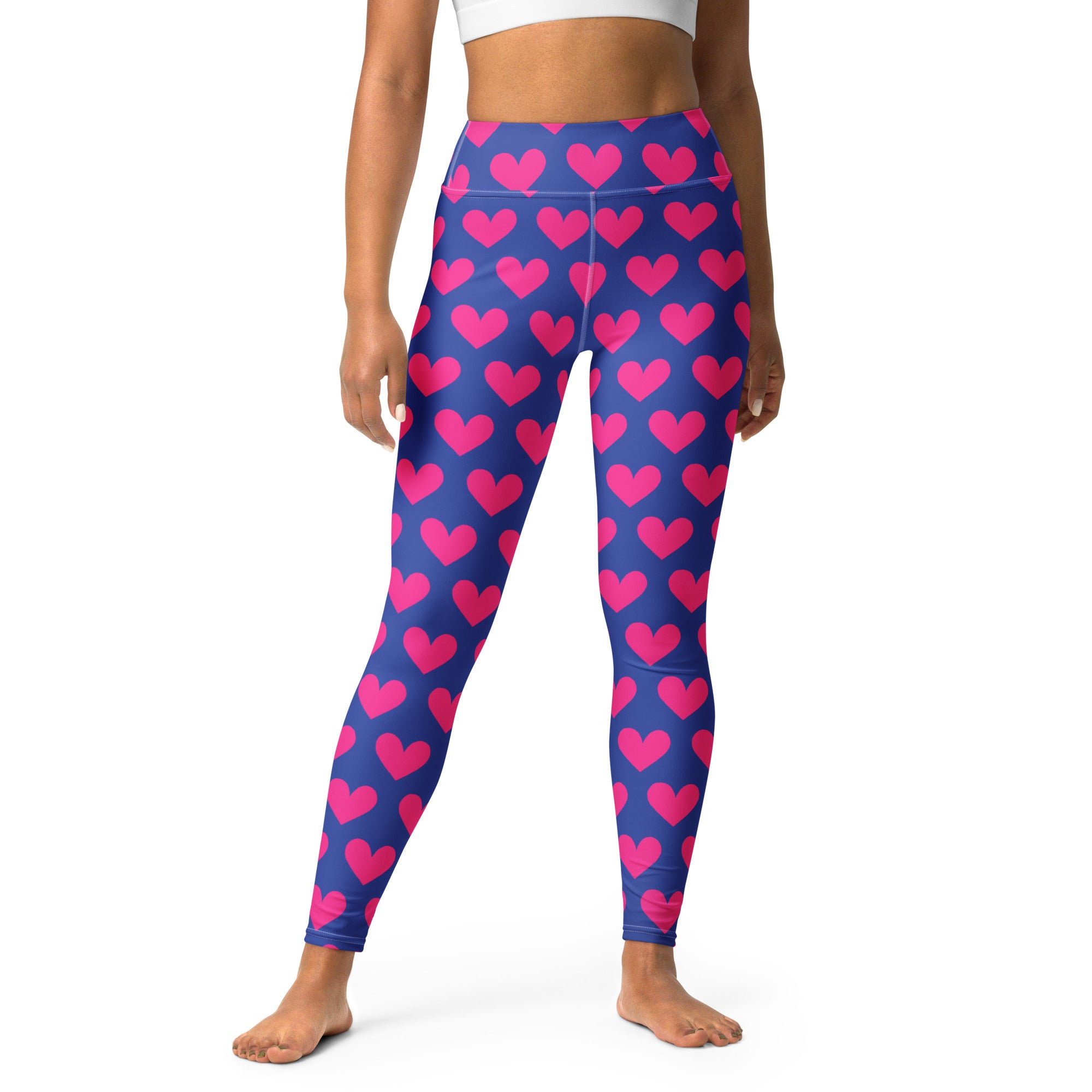 Colorful yoga leggings with blue and pink hearts pattern front side view