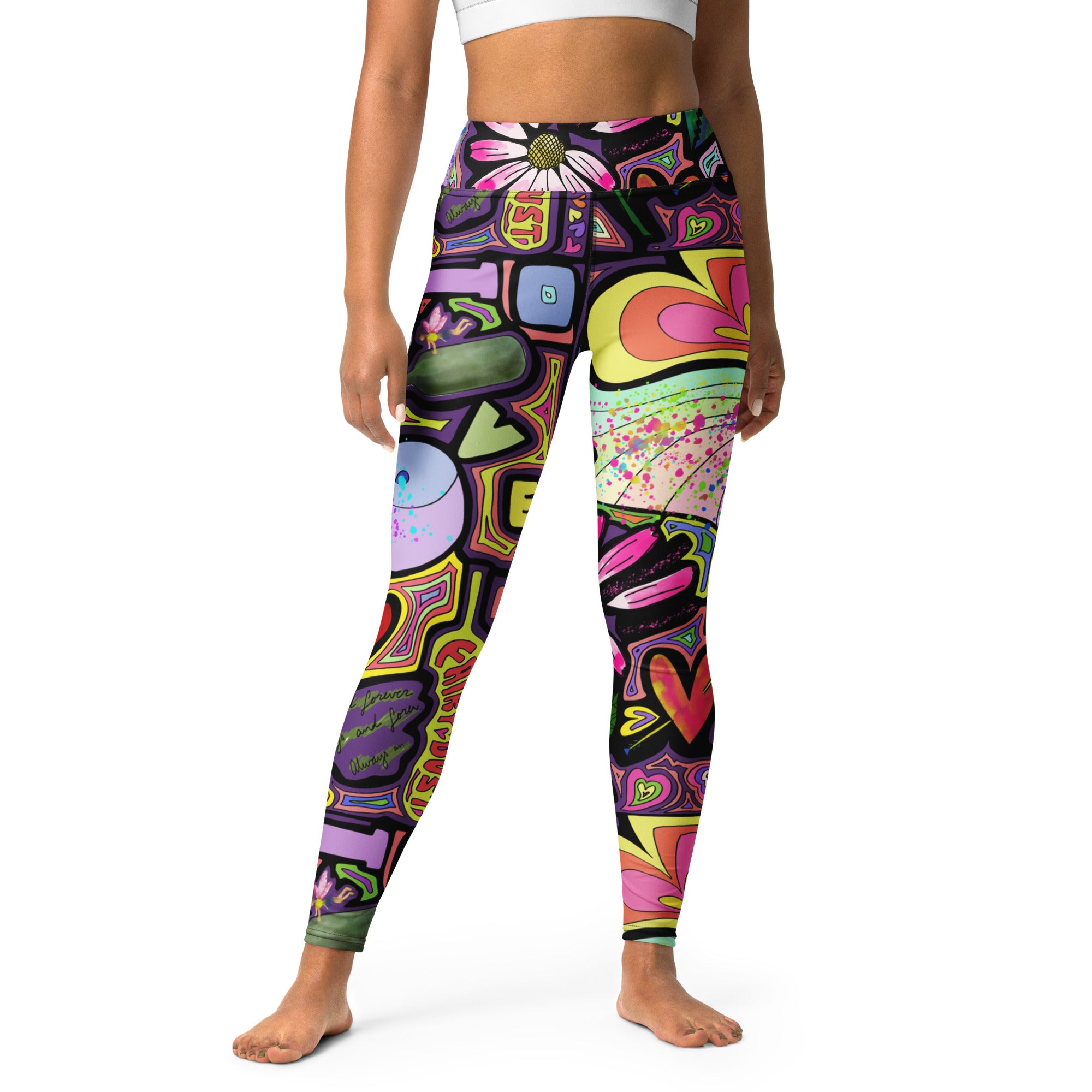 Colorful yoga leggings with fairy dust black print patterns, front view