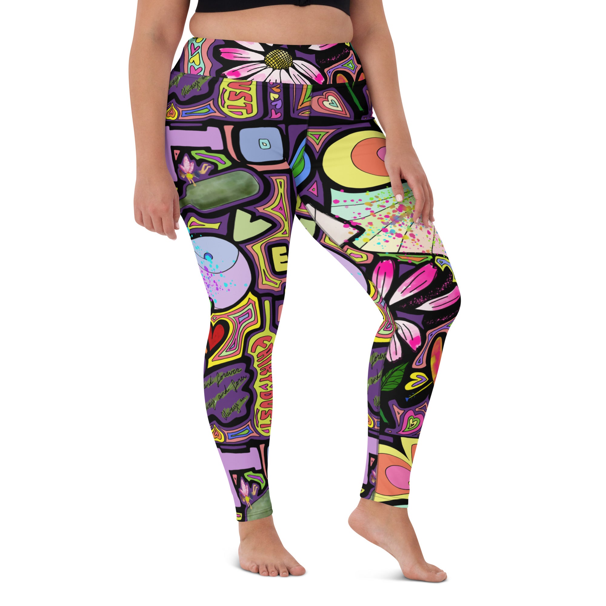 Colorful yoga leggings with fairy dust black print patterns, front view