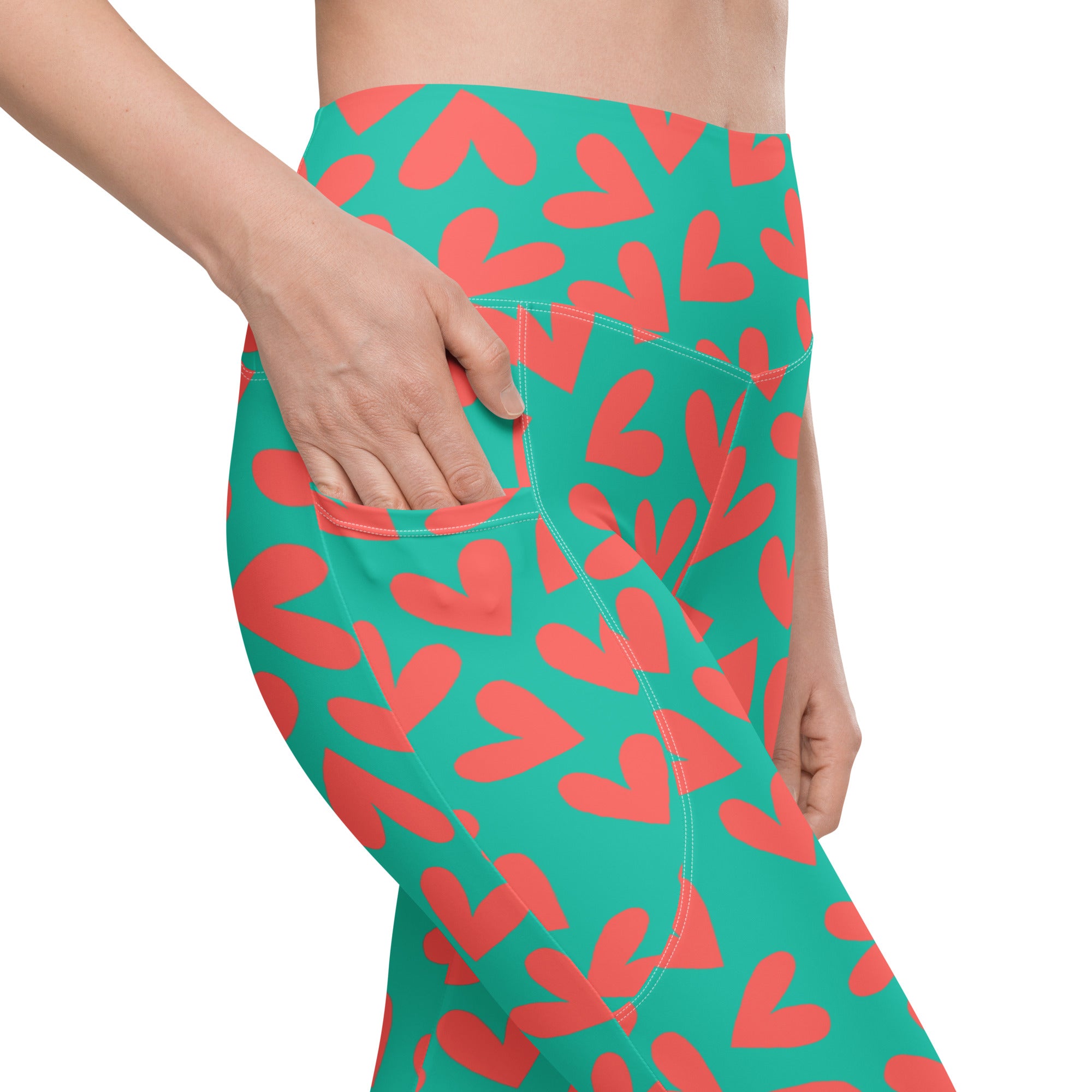 Colorful teal and pink hearts recycled yoga leggings with pockets, right pocket close up