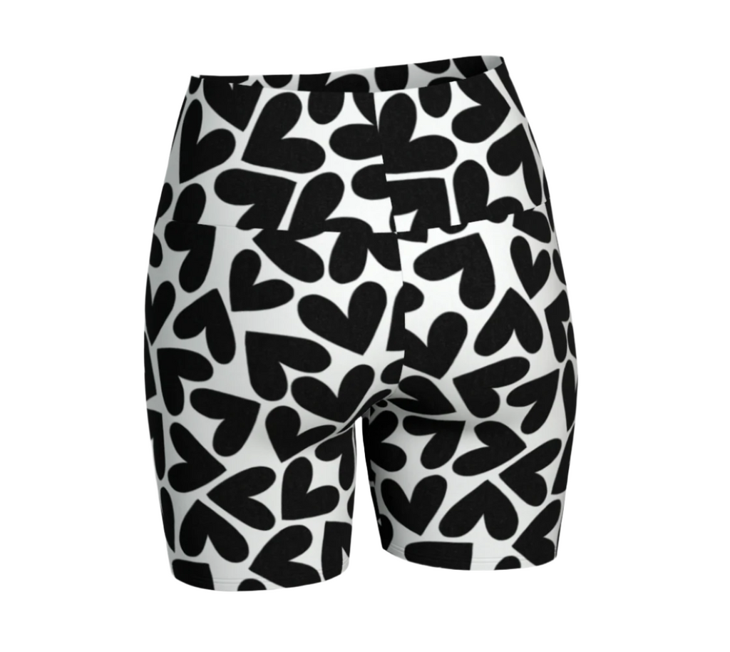 Black and white heart patterned shorts on a white background
