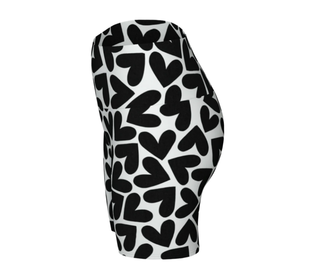 Black and white heart patterned shorts on a white background