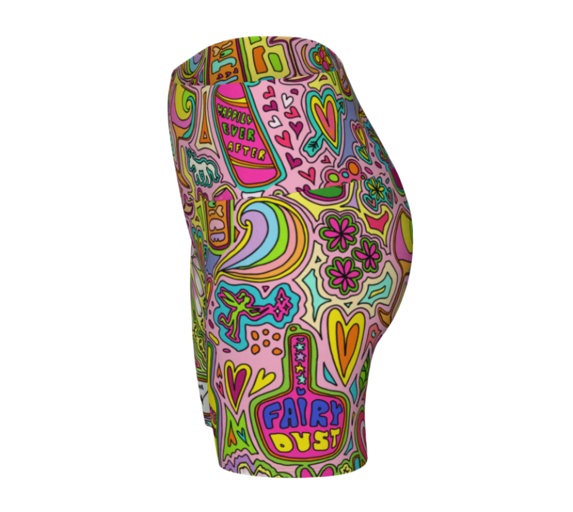 Colorful high-waisted yoga shorts with fairytale doodle design on a white background