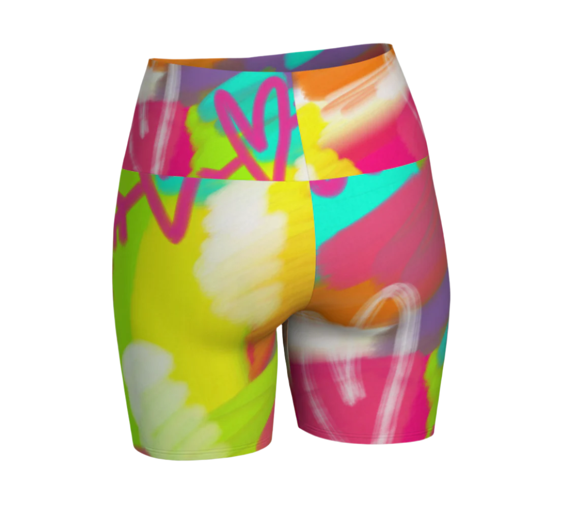 Colorful athletic shorts with abstract design on a white background