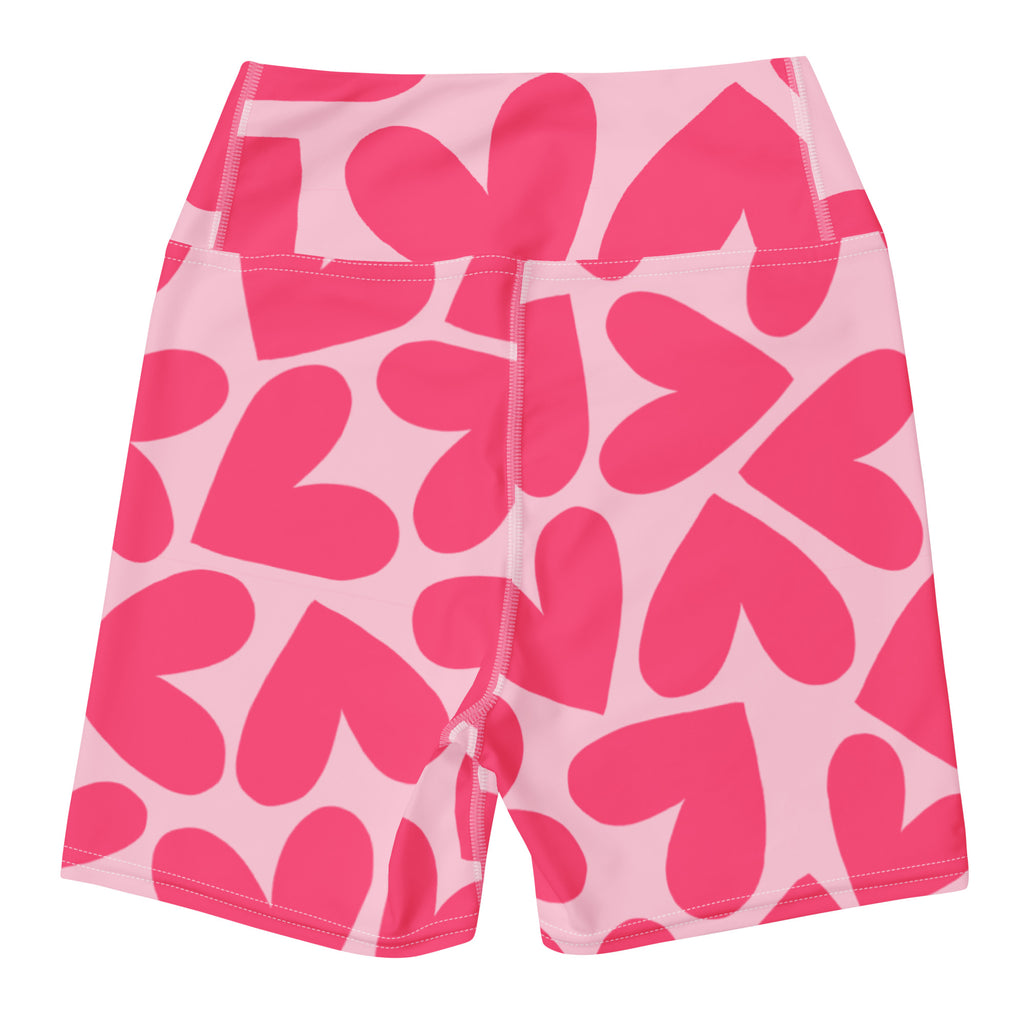 Pink shorts with heart pattern on a white background