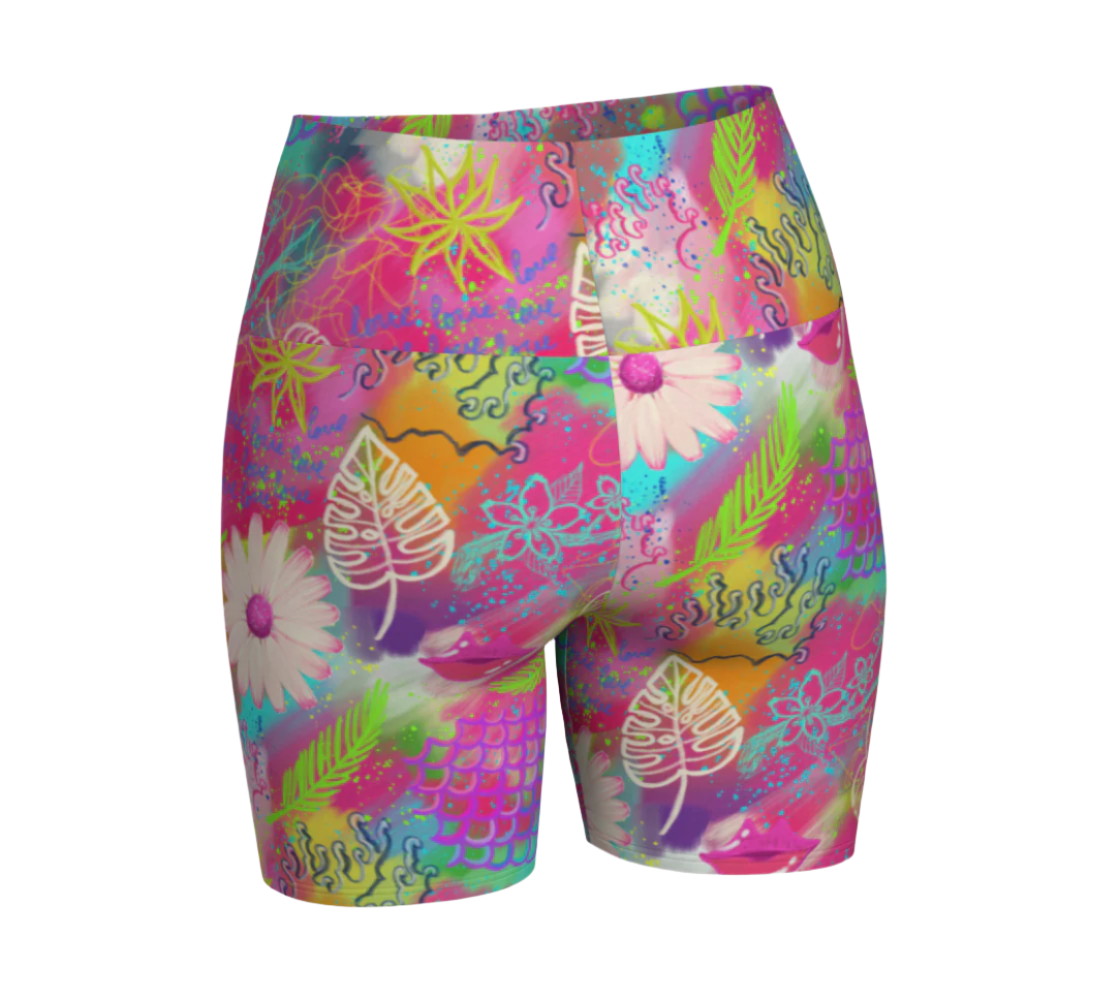 Colorful floral-patterned pink tropical yoga shorts on a white background