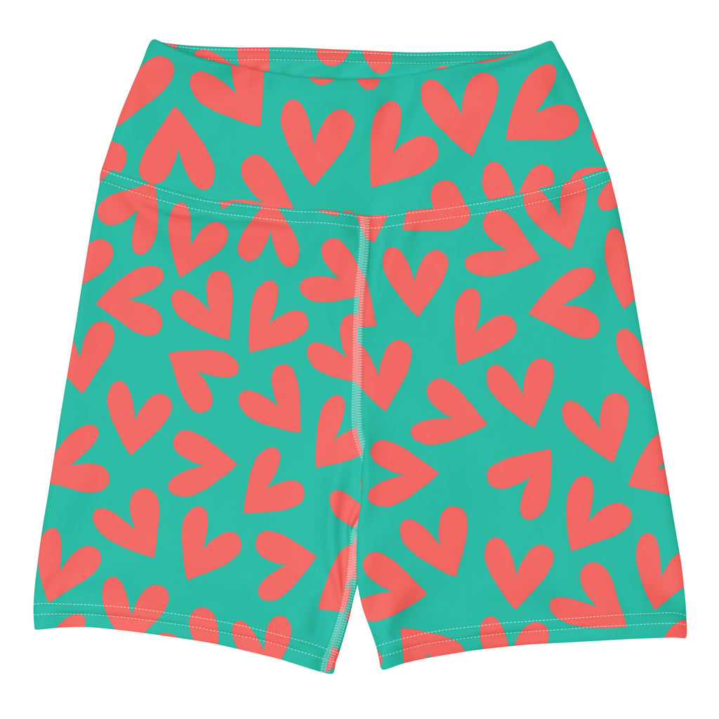 Colorful yoga shorts with teal and coral hearts print front flat view