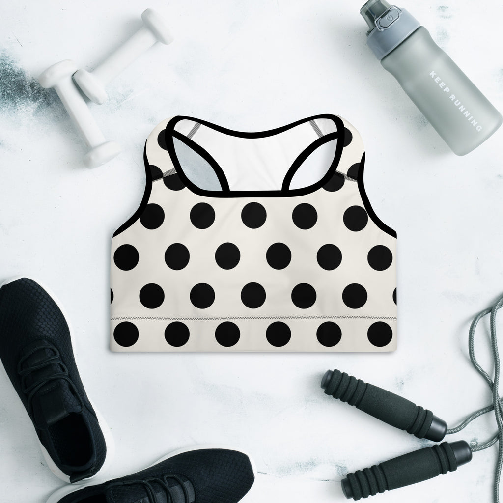 Cream and black polka dots sports bra flat view front side