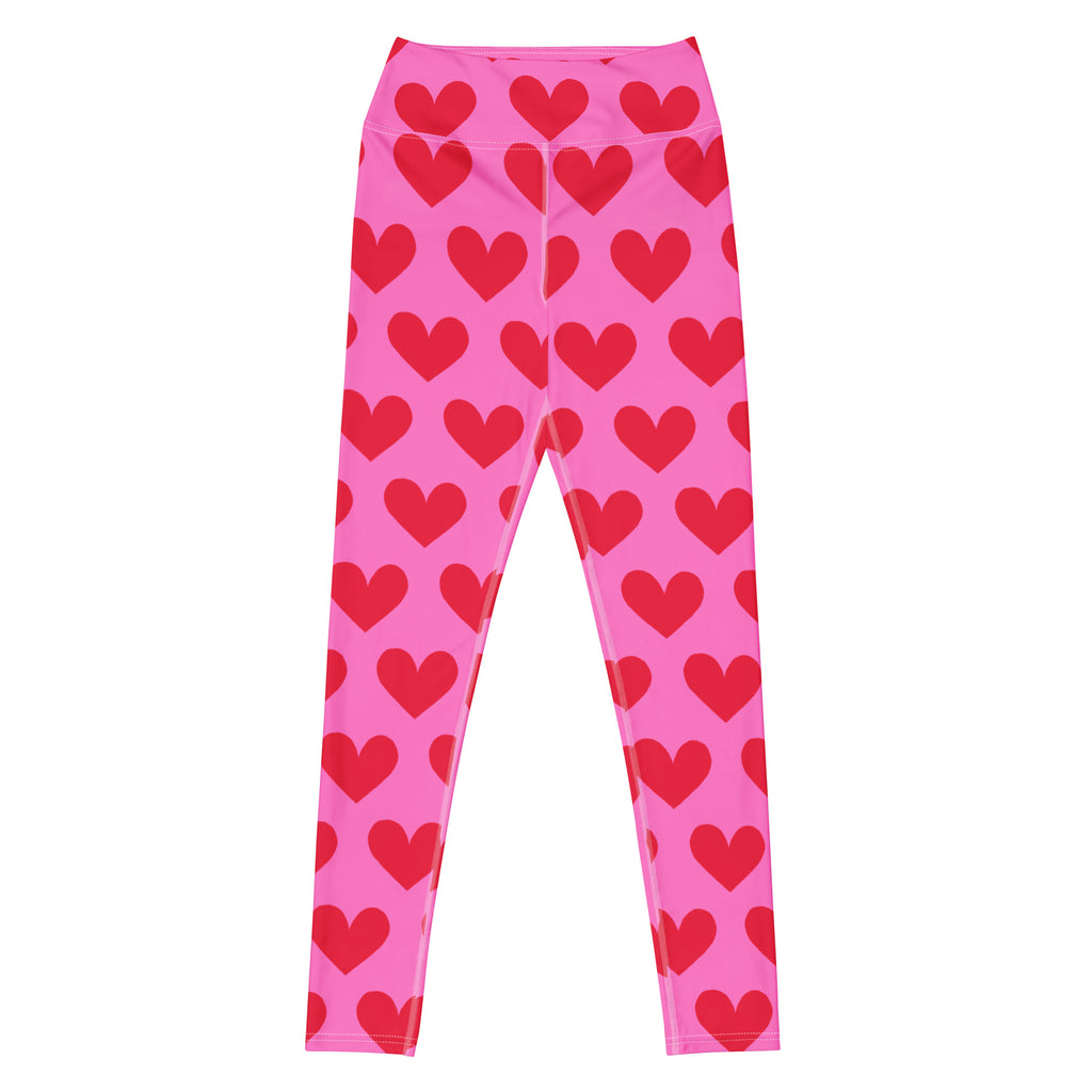 Yoga leggings with pink and red hearts pattern flat view