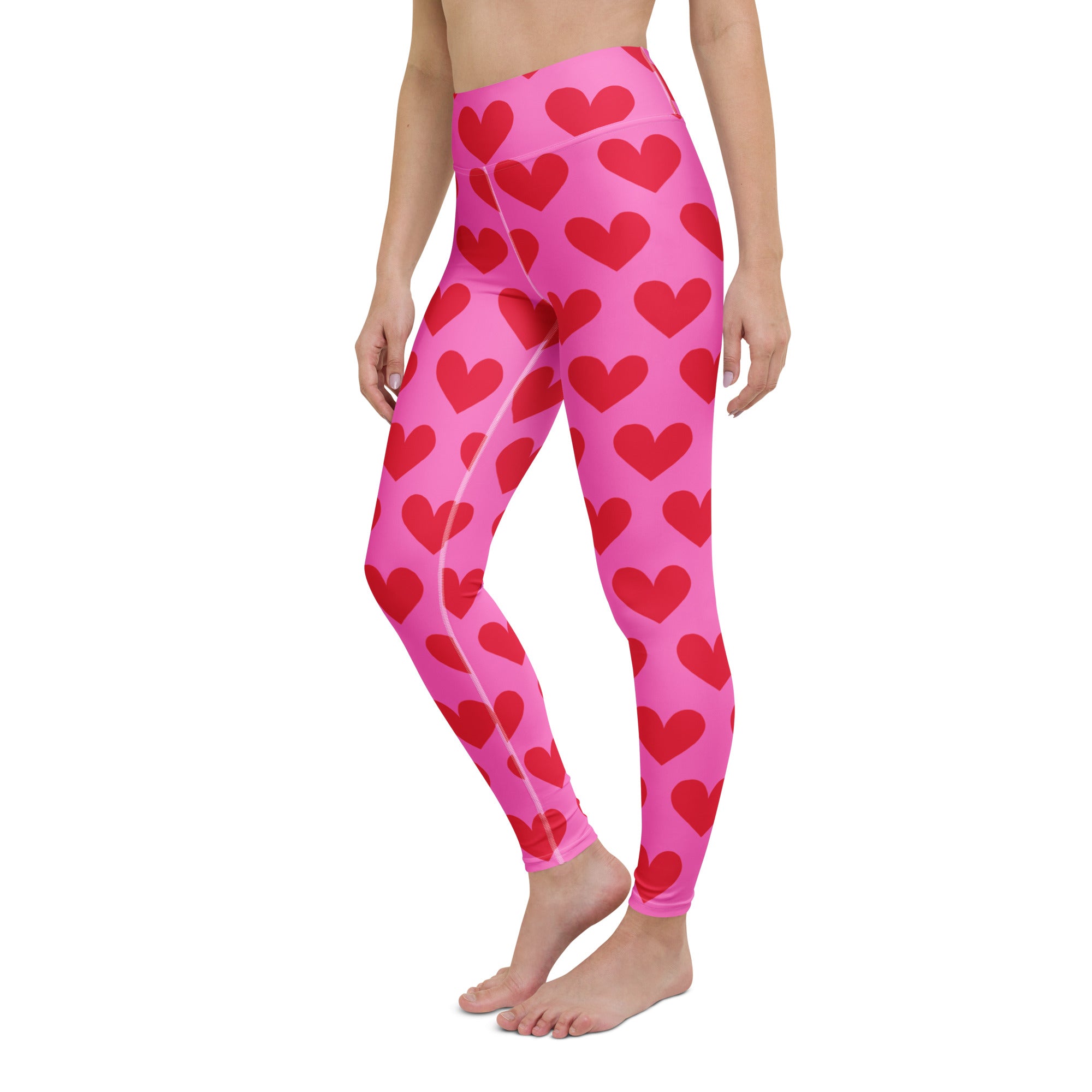 Yoga leggings with pink and red hearts pattern front side view