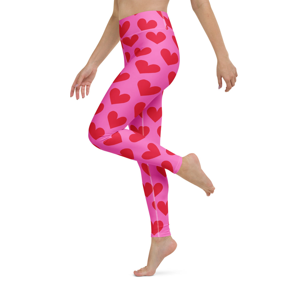Yoga leggings with pink and red hearts pattern side view
