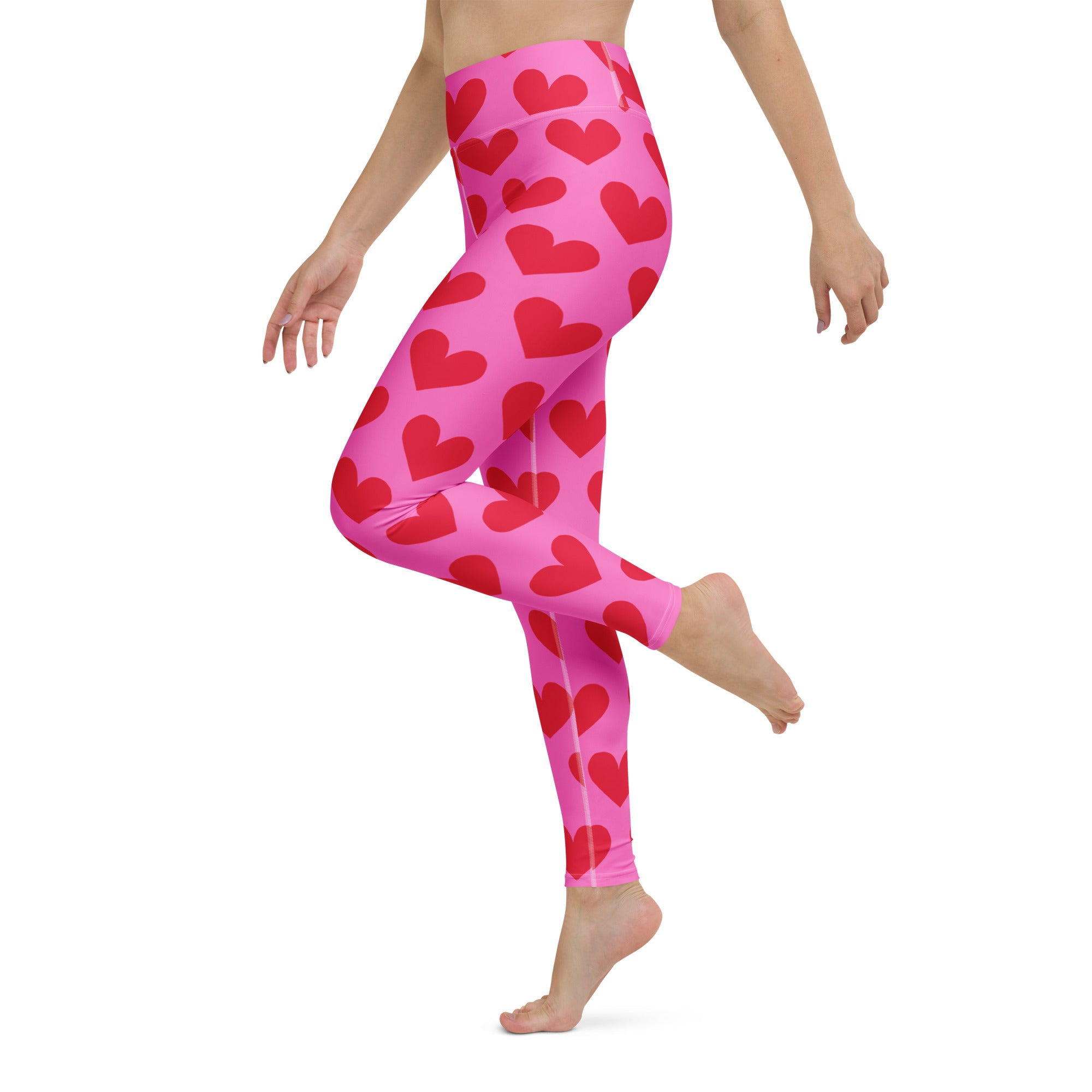 Yoga leggings with pink and red hearts pattern side view