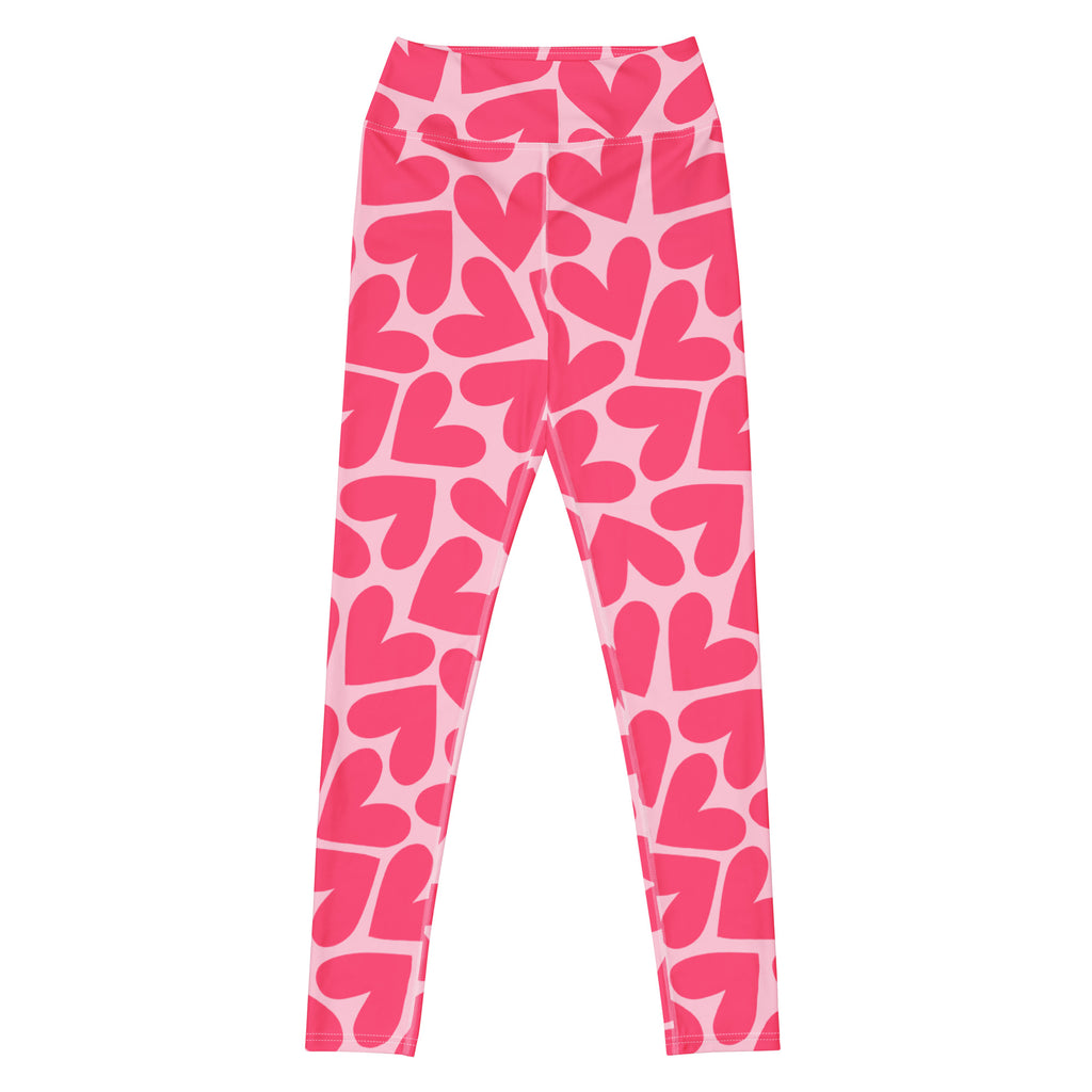 Yoga leggings with pink hearts pattern flat view