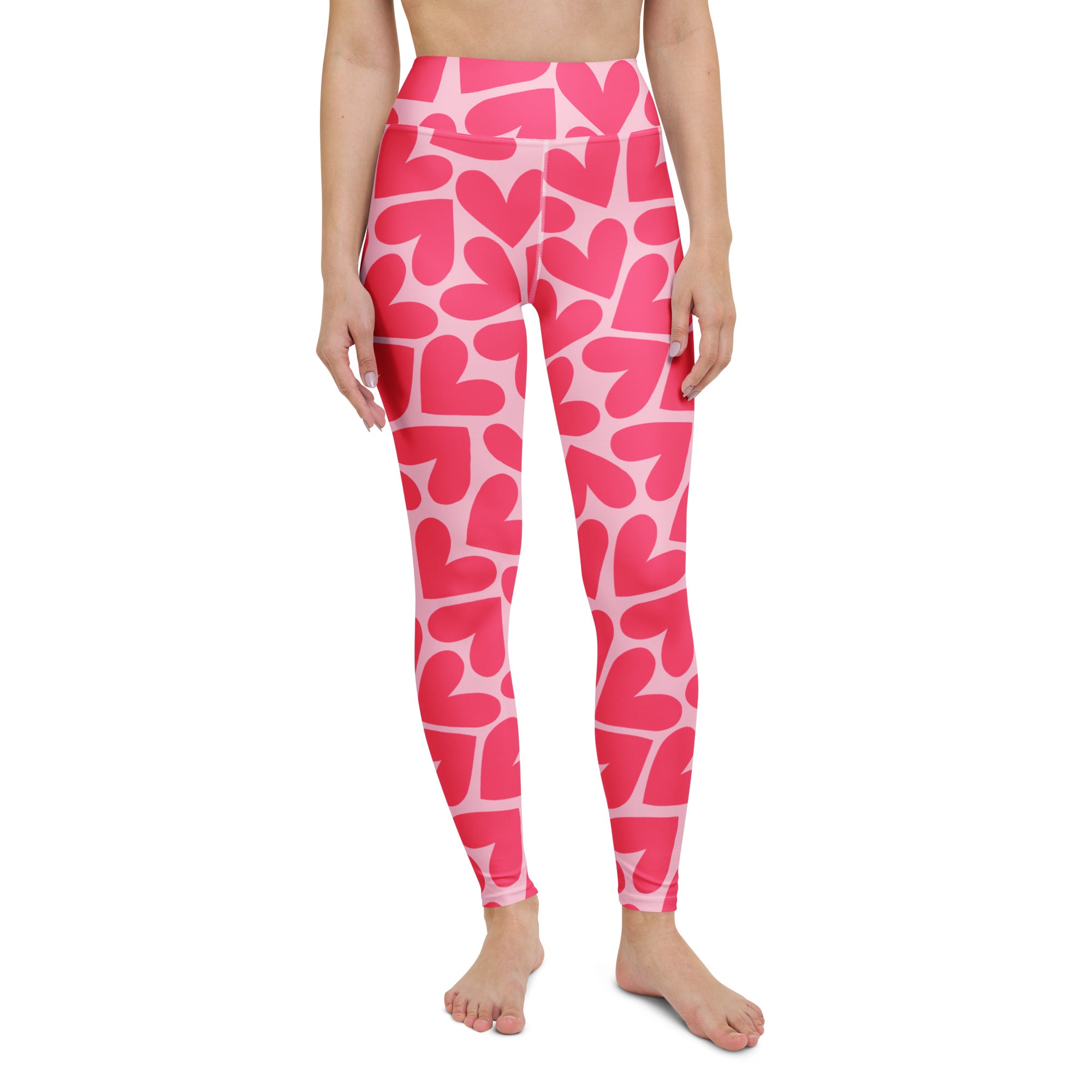 Yoga leggings with pink hearts pattern front view