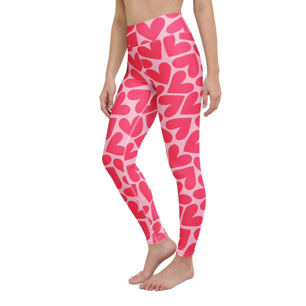 Yoga leggings with pink hearts pattern left front view