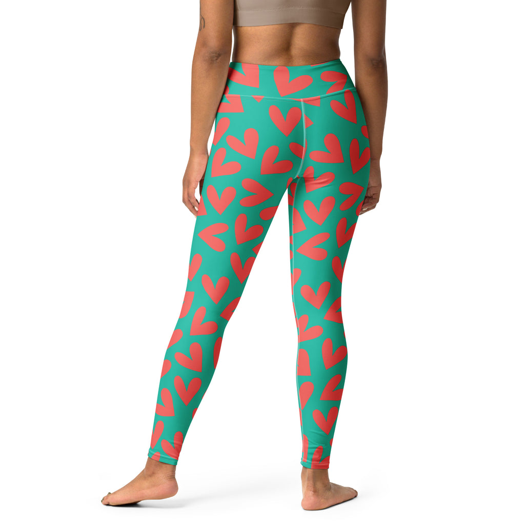 Yoga leggings with teal and pink hearts pattern back view