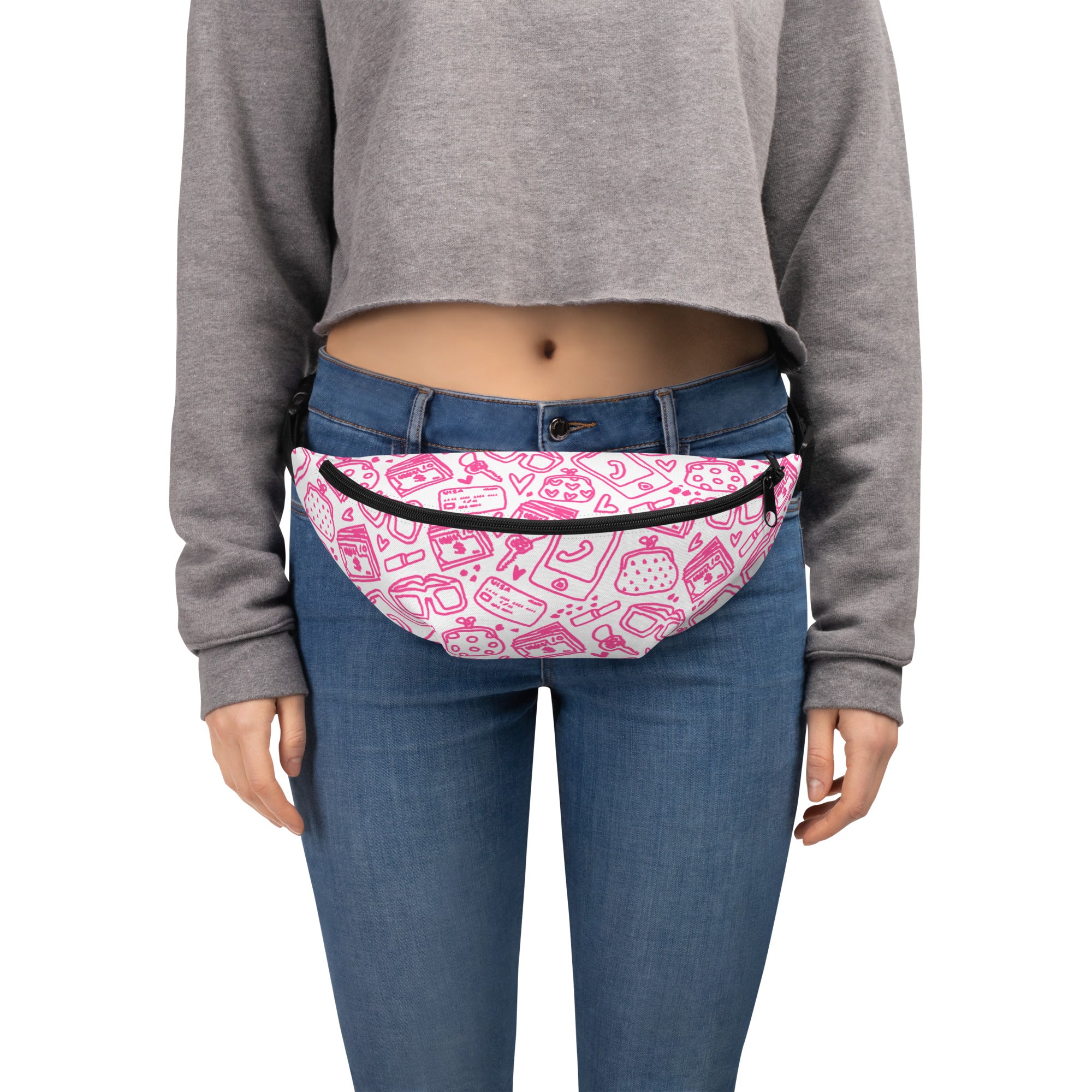 White fannypack with pink doodles of what's in my bag, worn by a person
